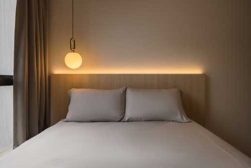 Modern Bedroom at Riverfront Residences