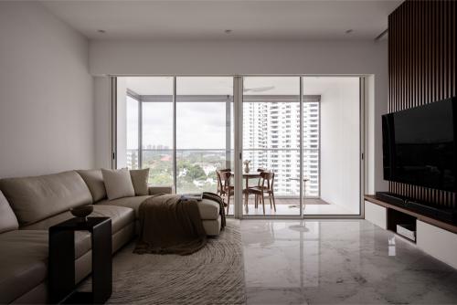 Minimalist Living Room at Nathan Suites