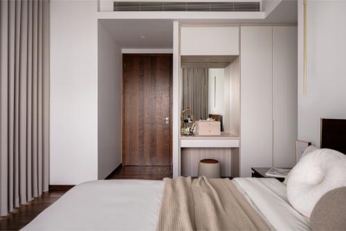 Minimalist Bedroom at Nathan Suites