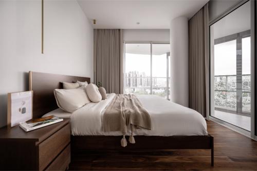 Minimalist Bedroom at Nathan Suites
