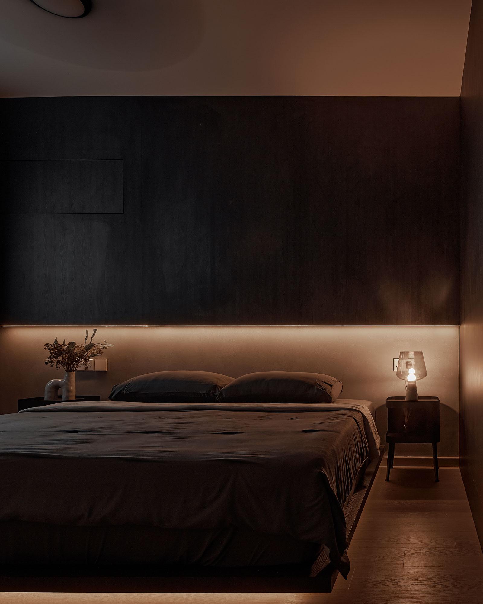Contemporary Bedroom with Cove Lighting and Bedside Table