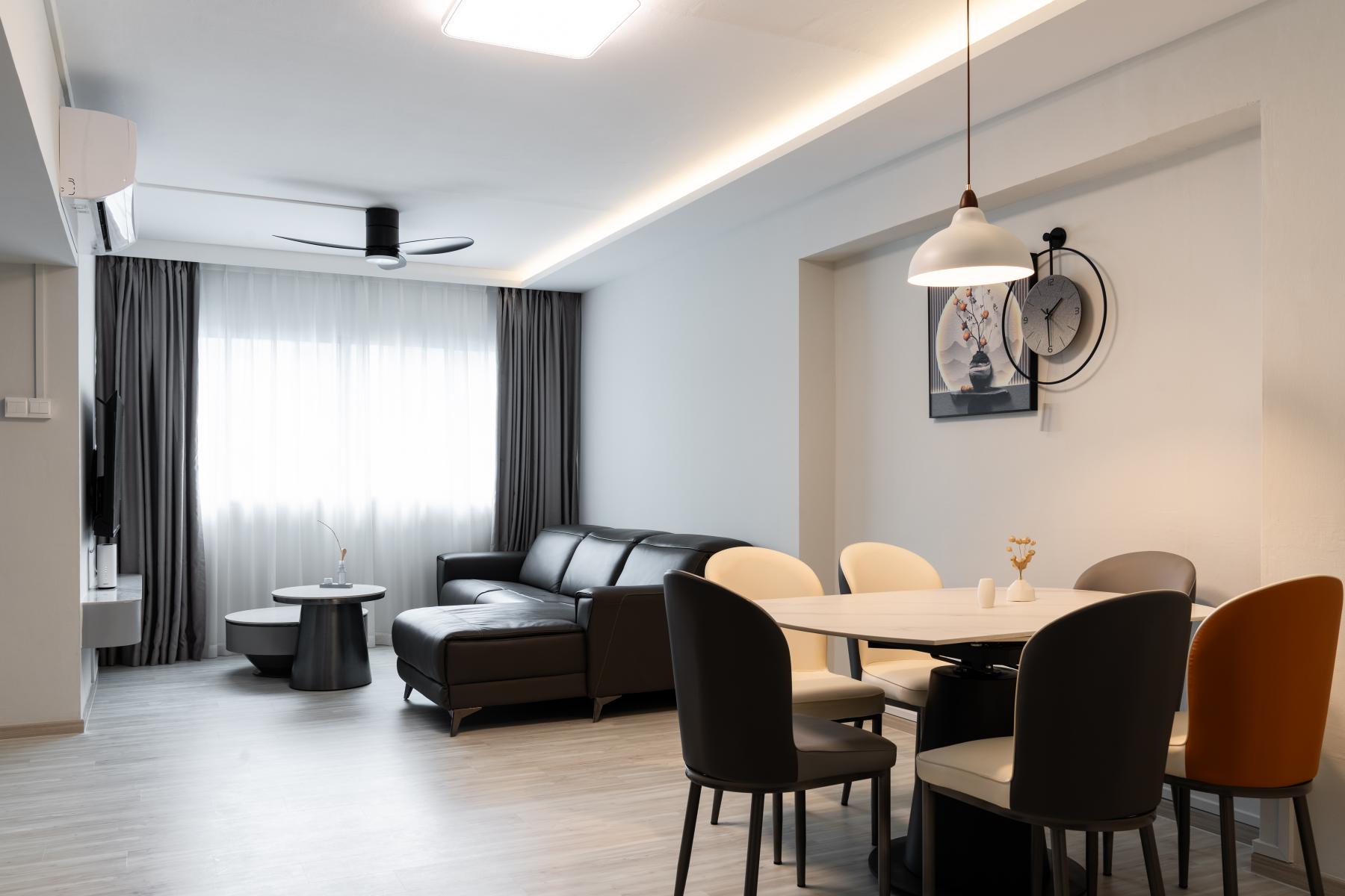 Contemporary Living Room with TV Console and Paintings