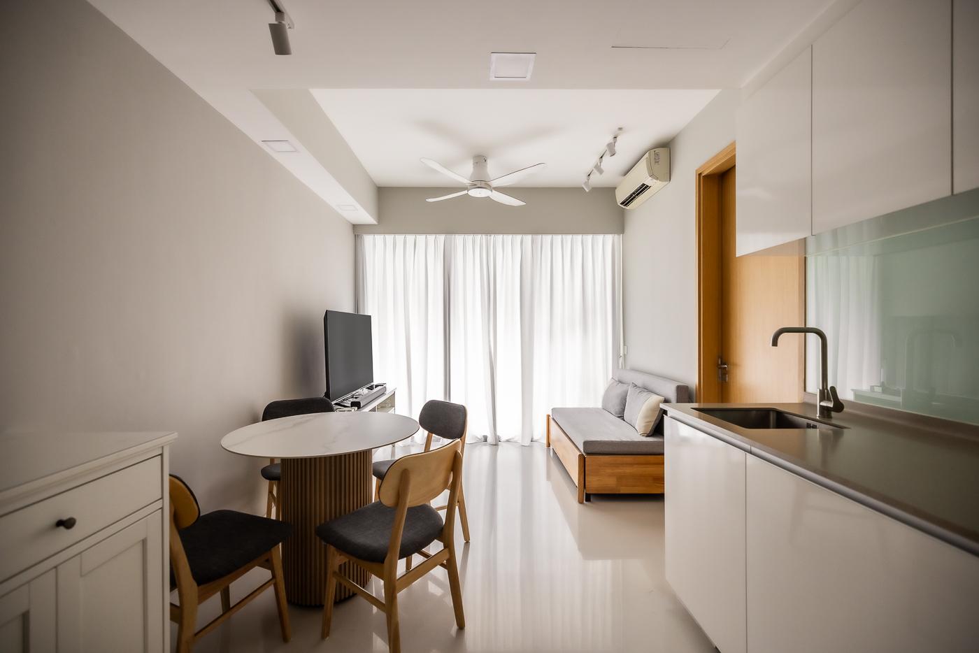 Minimalist Living Room with Homogeneous Tiles and TV Console