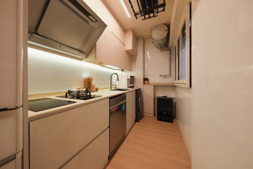 Minimalist Kitchen at 311C Clementi