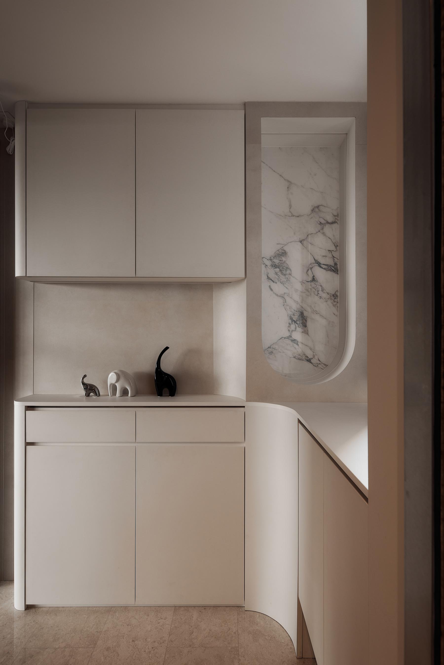 Modern Hallway with Storage Cabinets and Small Storage