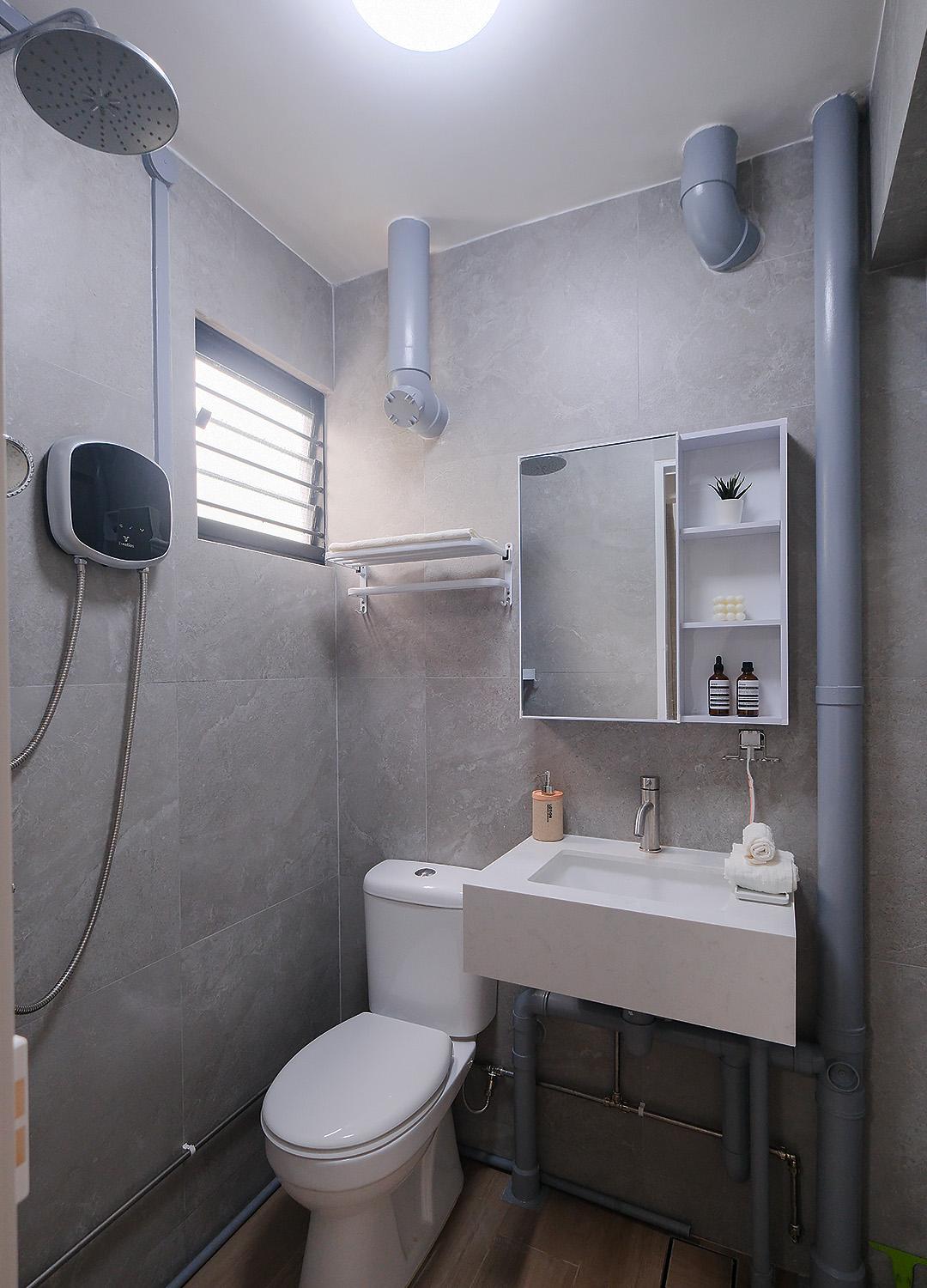Scandinavian Bathroom with Mirror and Laundry Baskets