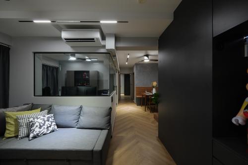Minimalist Living Room at 129A Plantation Cresent