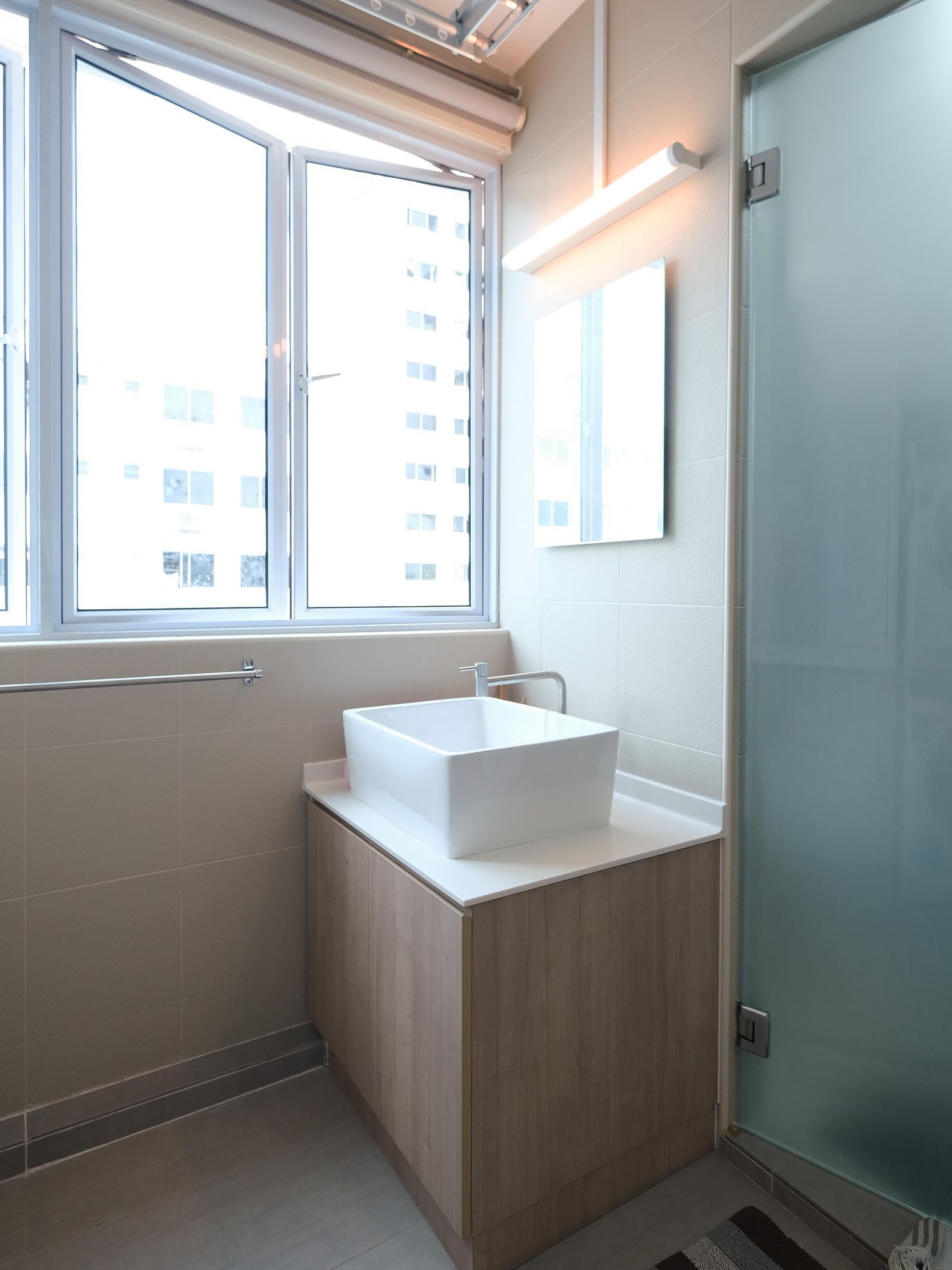 Scandinavian Bathroom with Mirror and Laundry Baskets