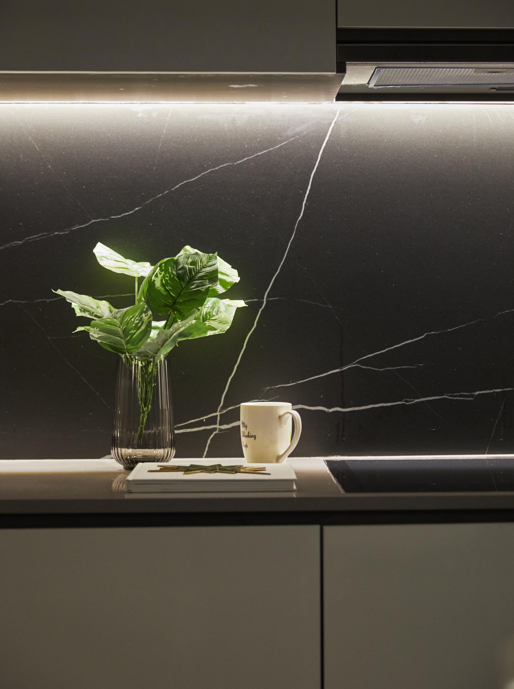 Scandinavian Kitchen with Herringbone Tiling and Granite Floor