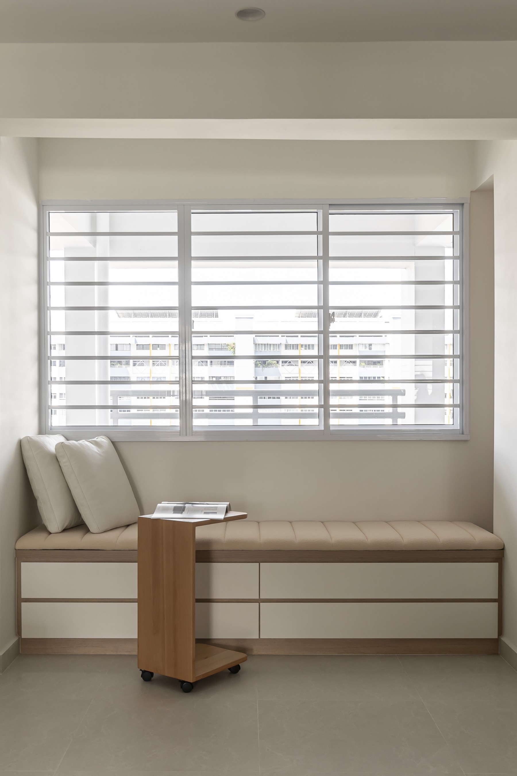 Scandinavian Entryway with Bay Window and Window Seat