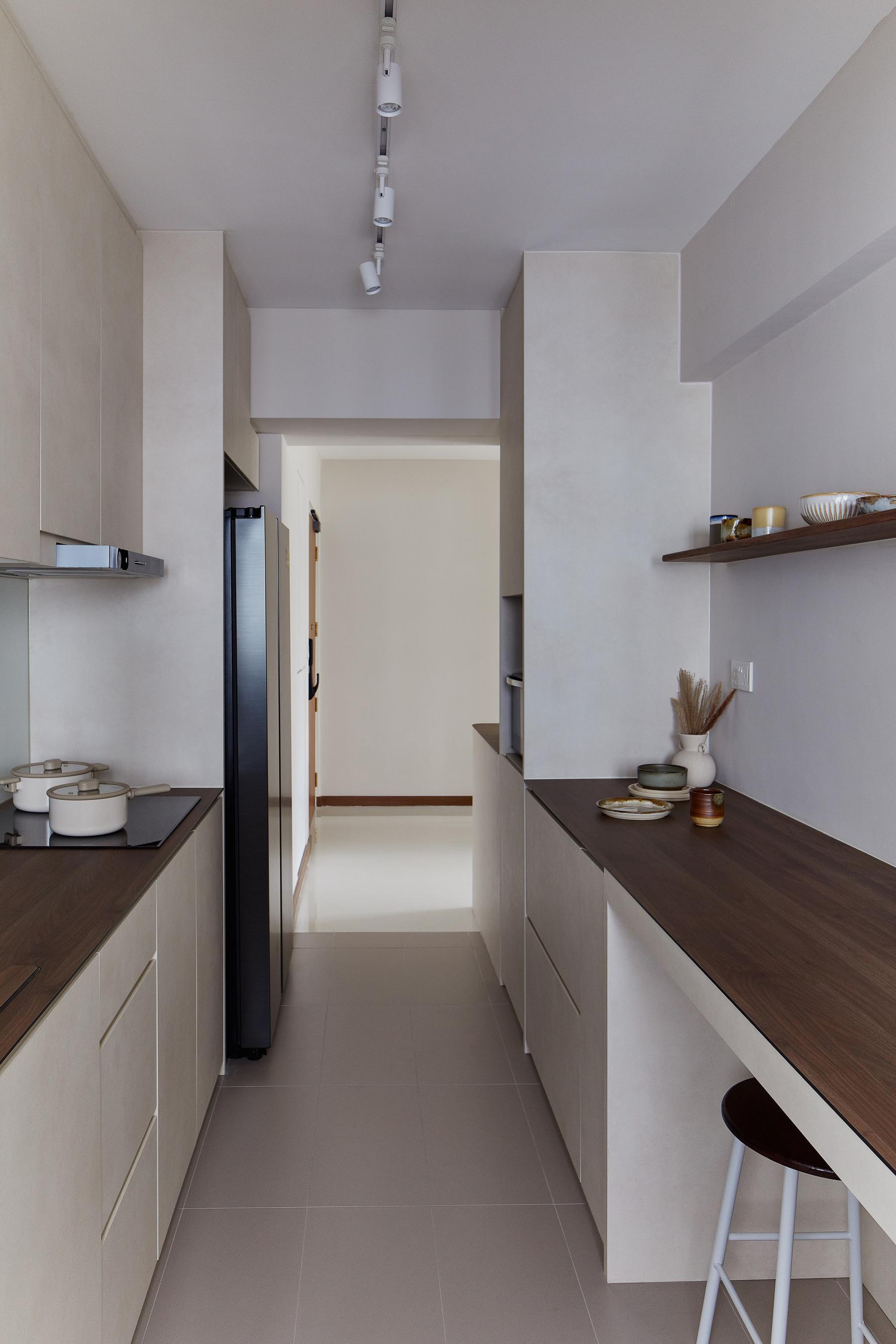 Scandinavian Kitchen with Homogeneous Tiles and Cupboard