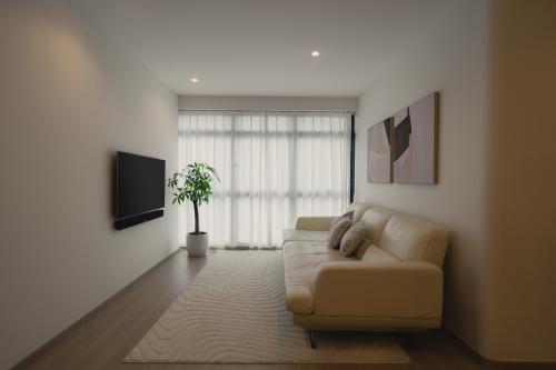 Minimalist Living Room at City Square Residences