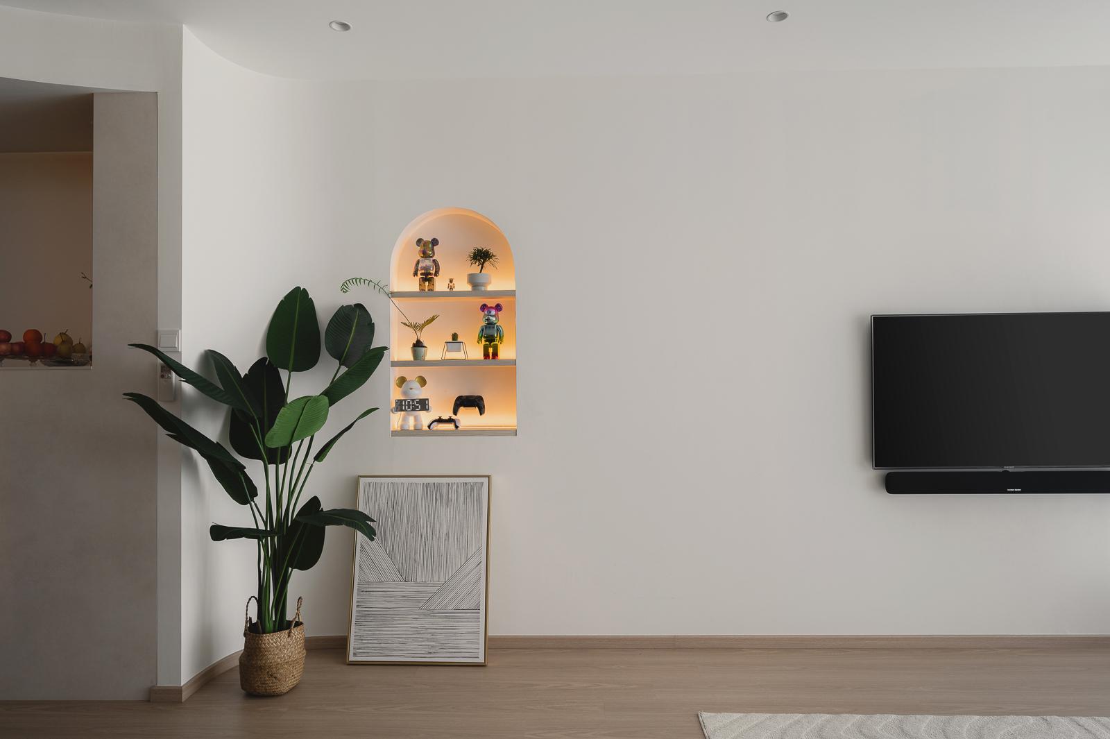 Minimalist Living Room with Bookshelf and Feature Wall