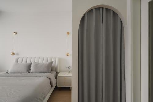 Minimalist Bedroom at City Square Residences