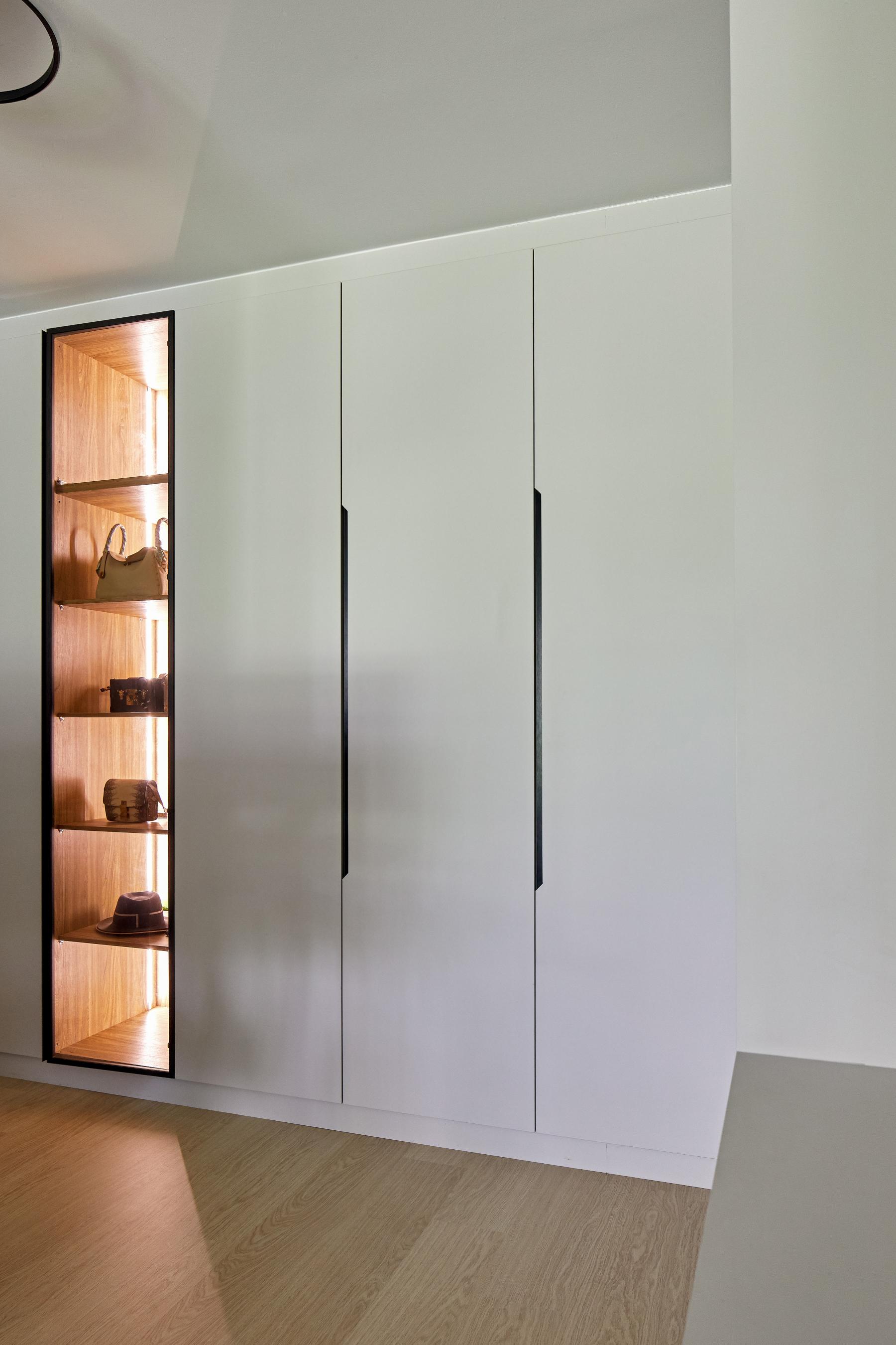 Modern Bedroom with Cove Lighting and Wardrobe