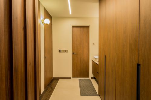 Transitional Walk-in Wardrobe at A & K Apt