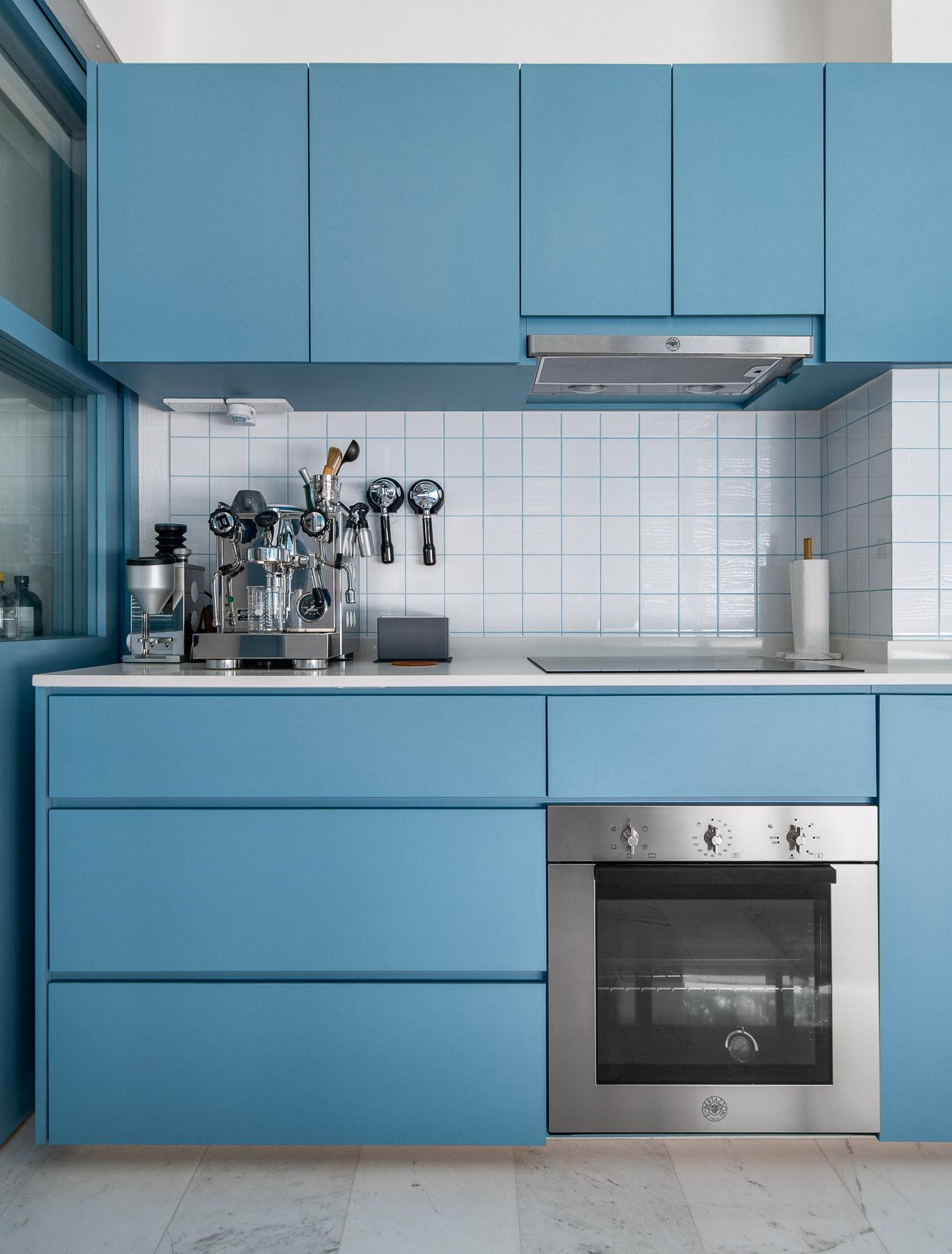 Eclectic Kitchen with Countertop and Herringbone Tiling