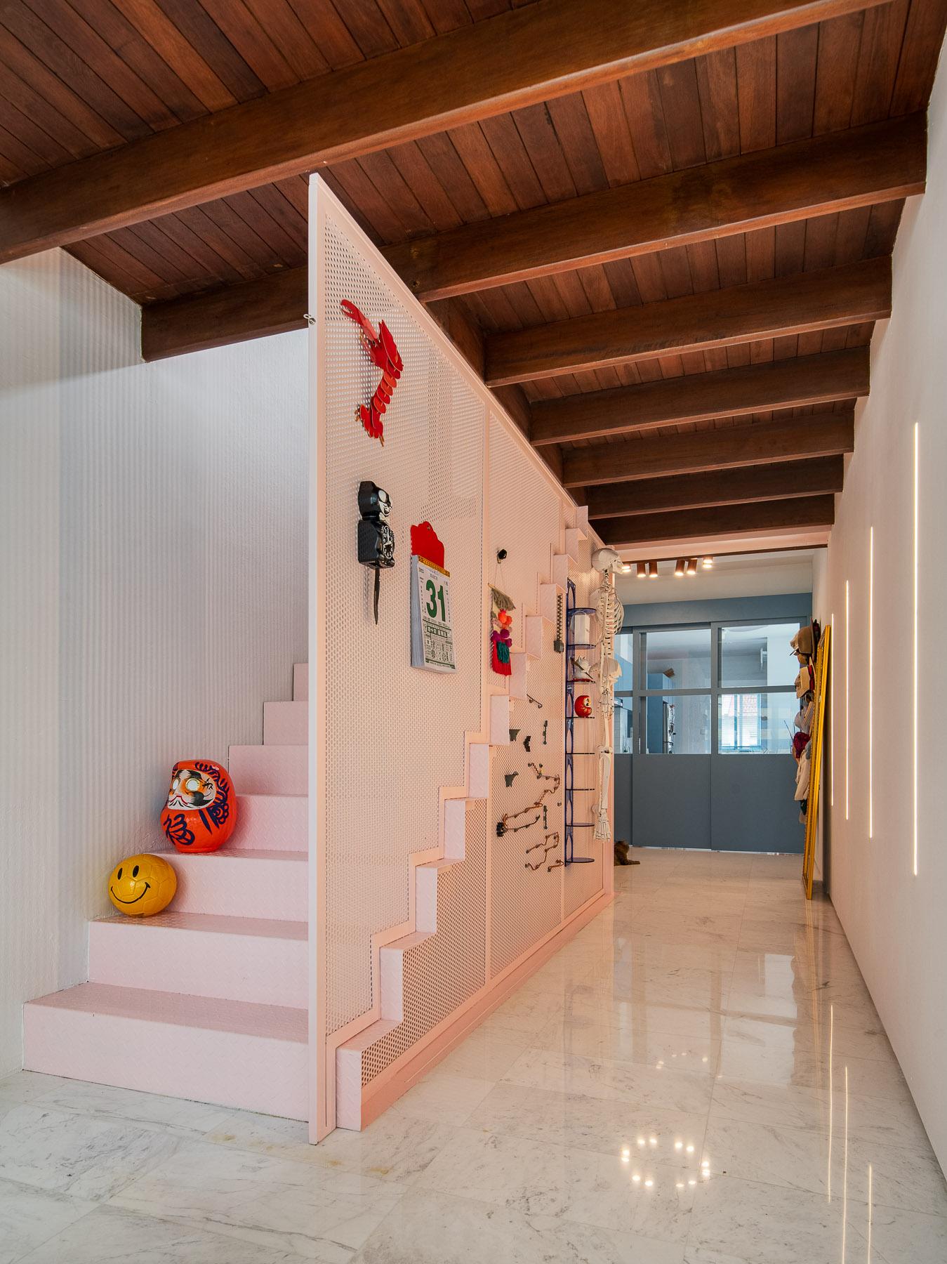 Eclectic Entryway with Seating Bench and Shoe Rack