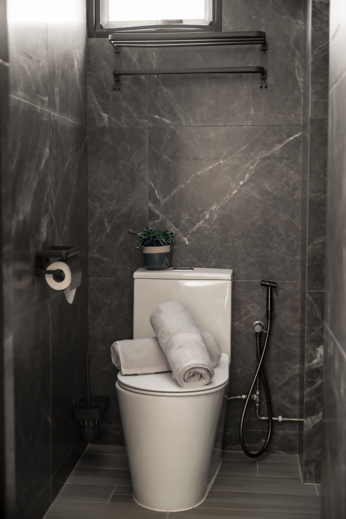 Contemporary Bathroom with Homogeneous Tiles and Drying Racks