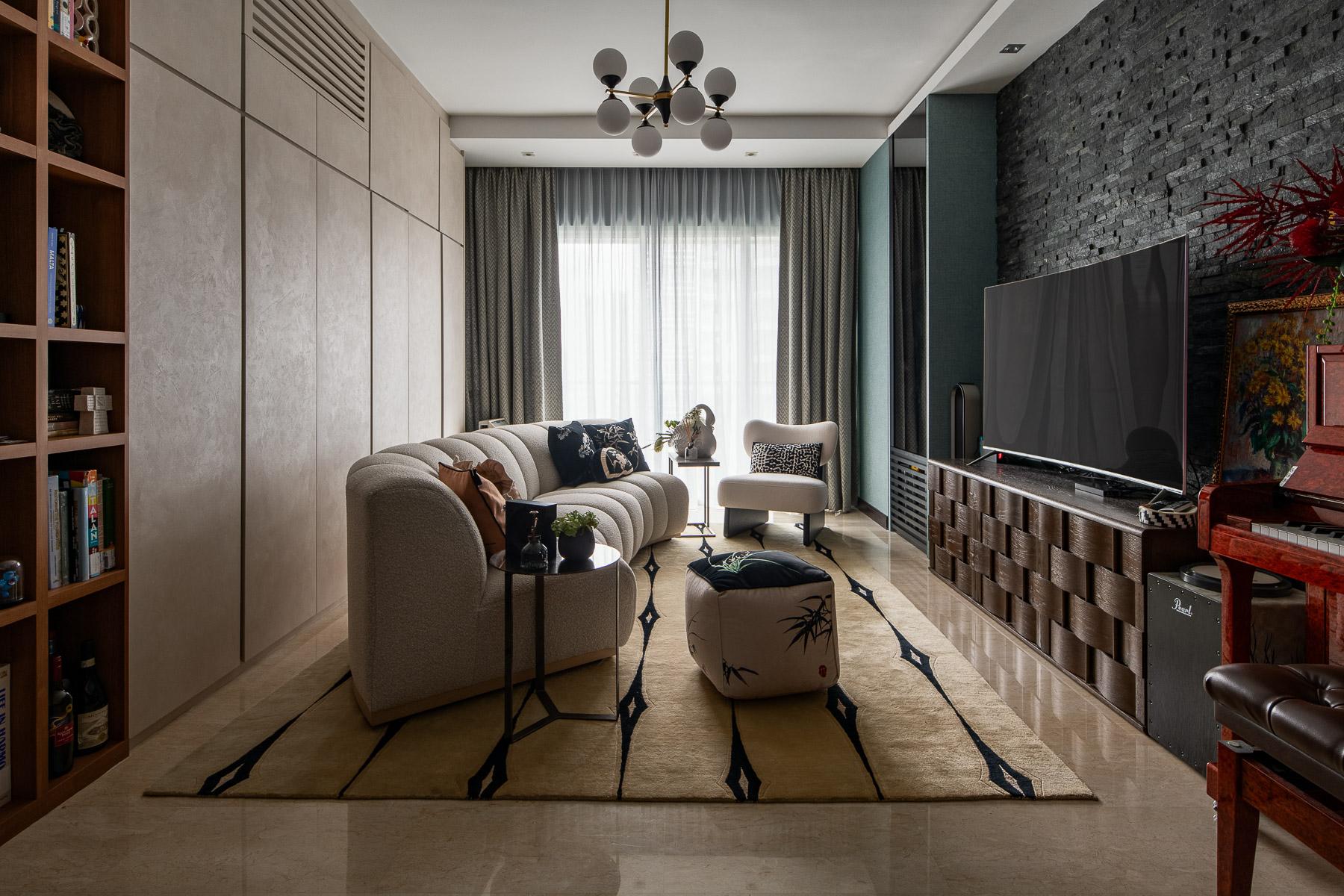 Eclectic Living Room with Bookshelf and Marble Floor