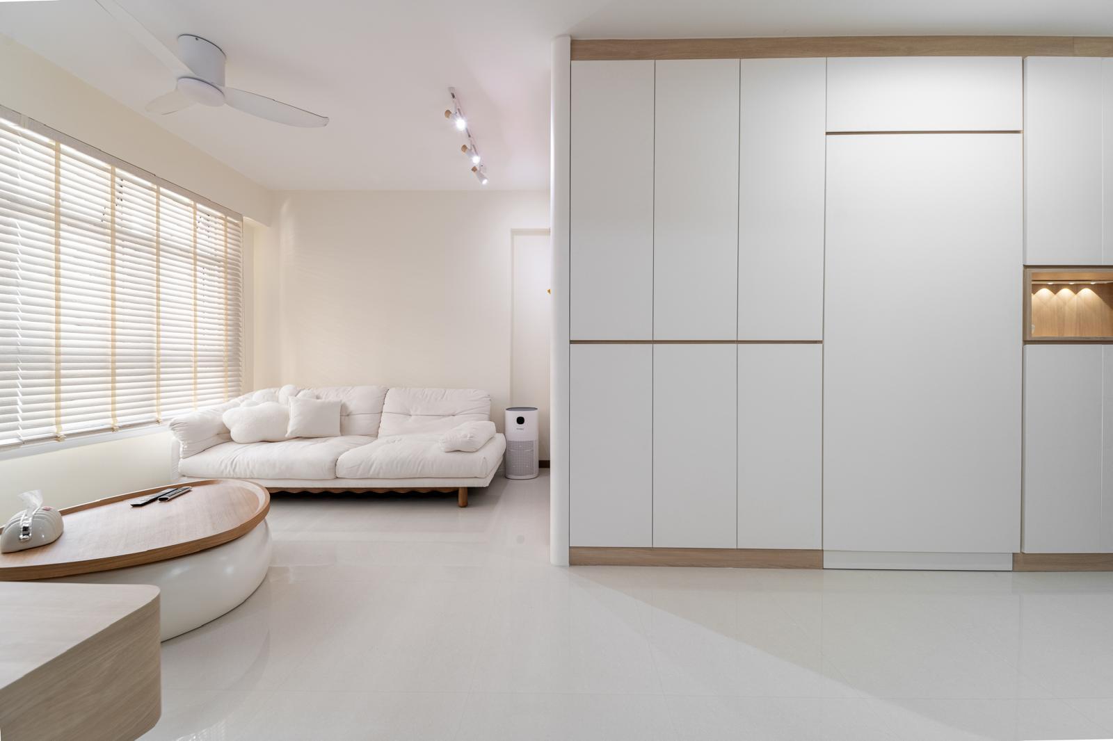 Contemporary Living Room with Homogeneous Tiles and Paintings