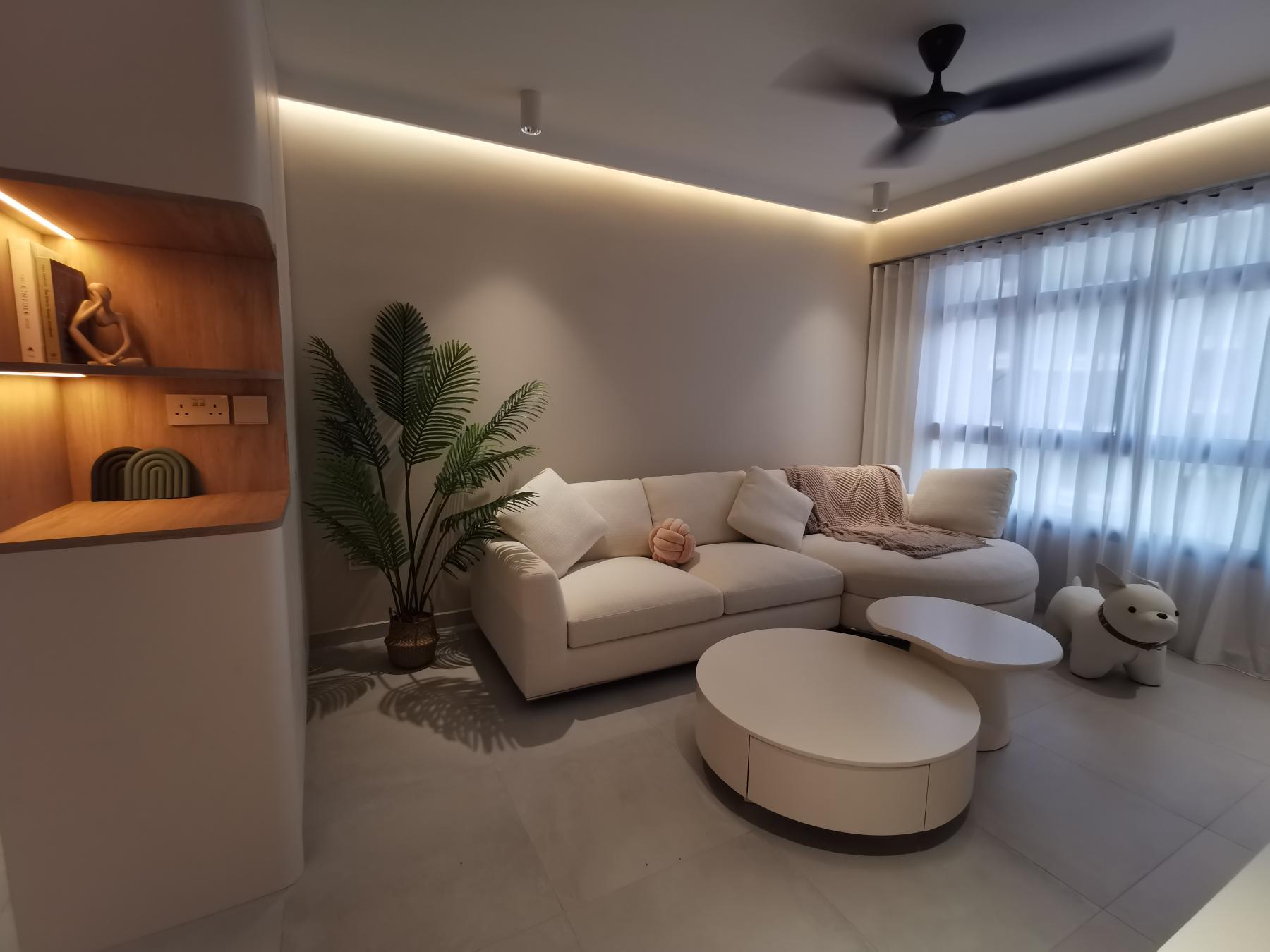 Scandinavian Living Room with Homogeneous Tiles and Cove Lighting