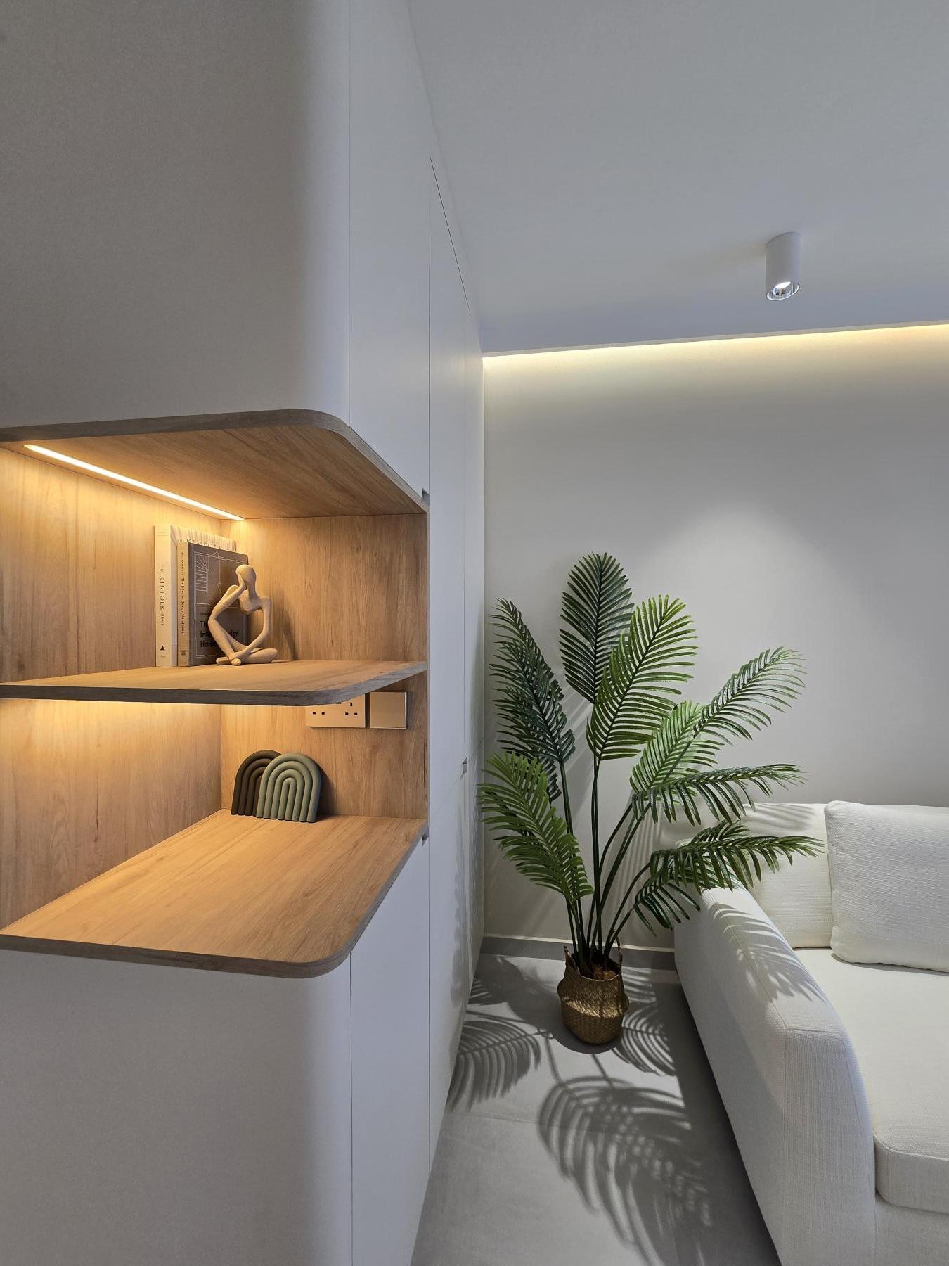 Scandinavian Living Room with Bookshelf and Homogeneous Tiles