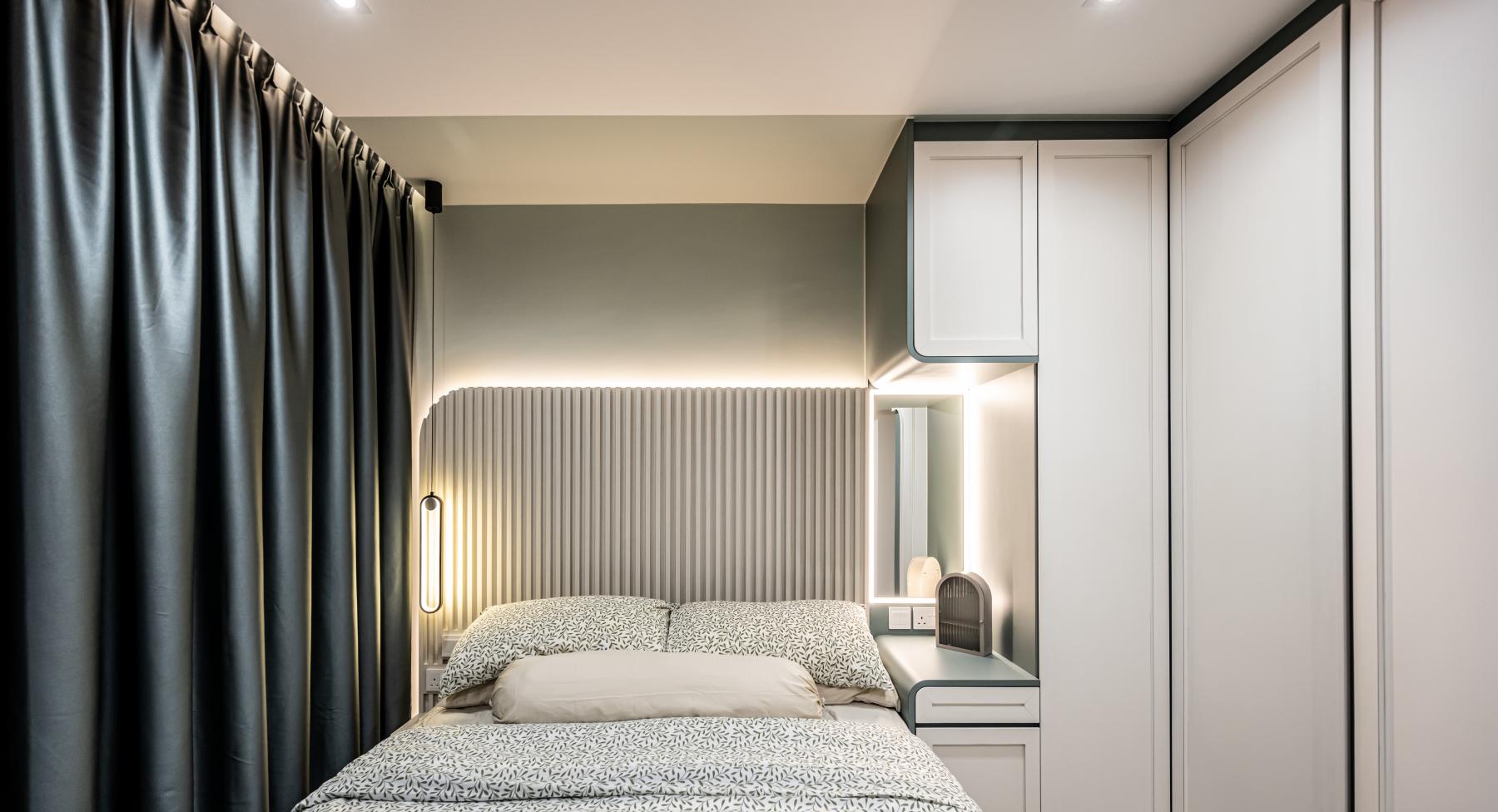 Contemporary Bedroom with Cove Lighting and Wardrobe