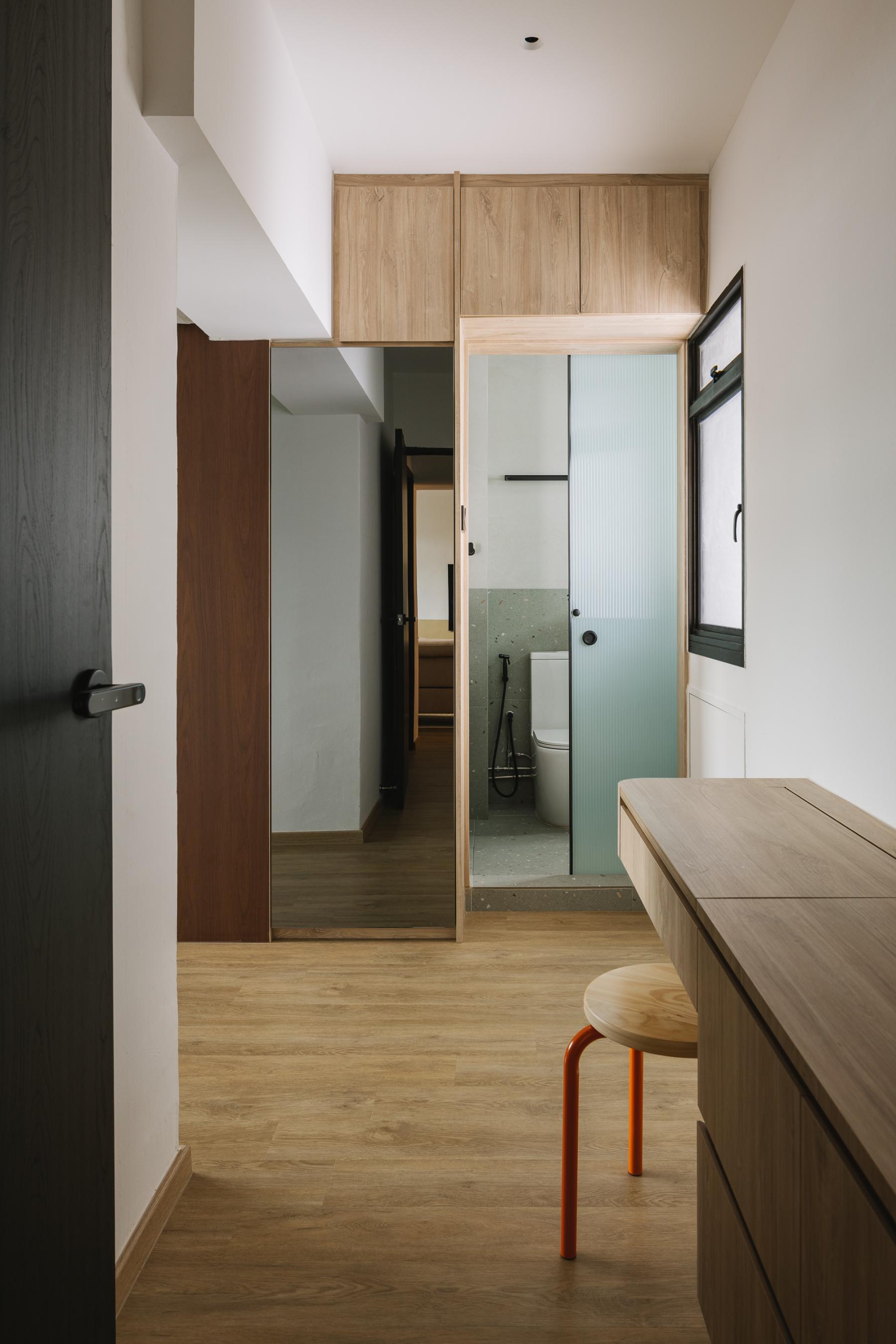 Scandinavian Bedroom with Mirror and Glass Door