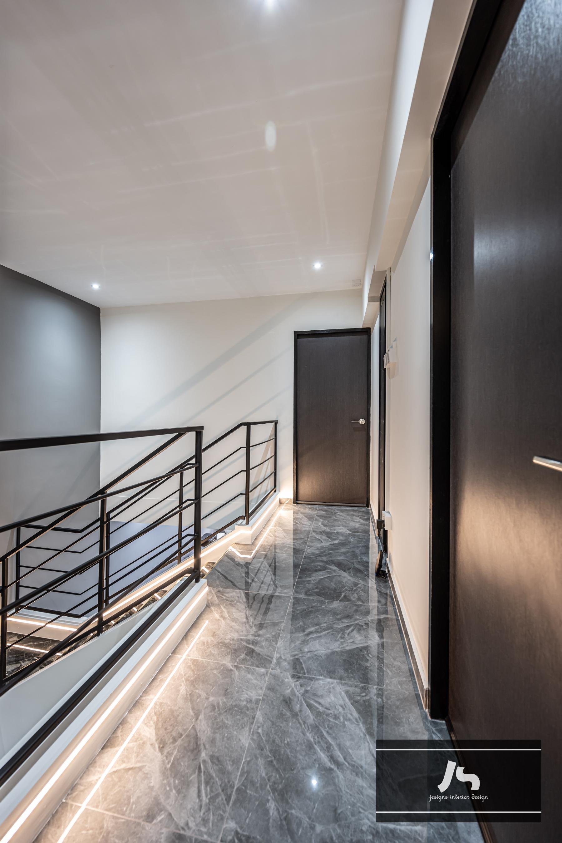 Modern Hallway with Marble Floor and Staircase