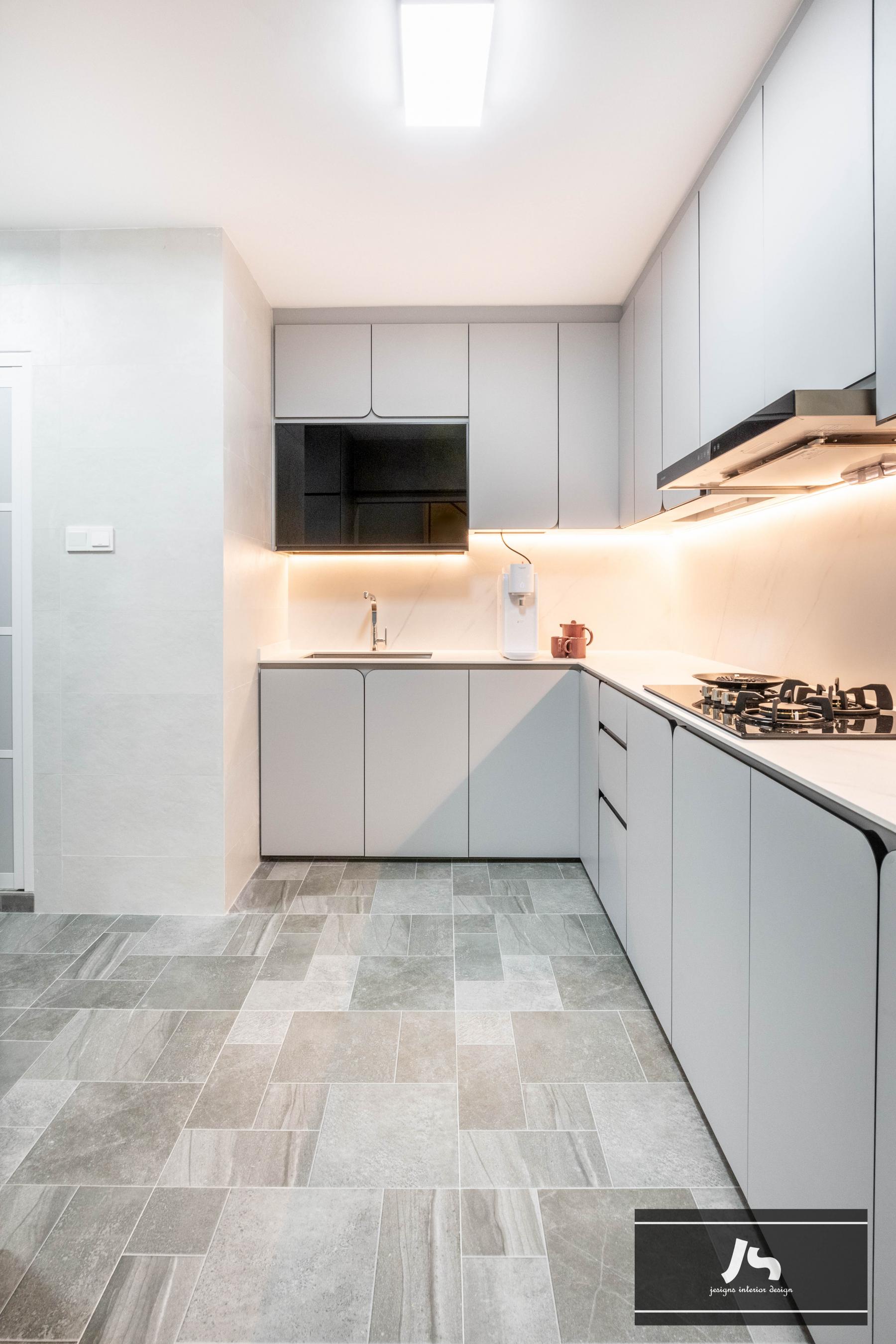 Minimalist Kitchen with Wood Flooring and Cupboard