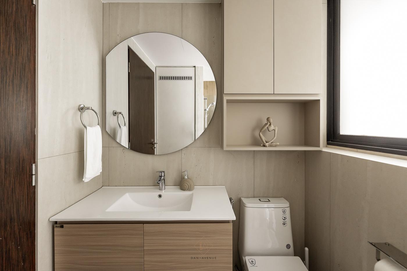 Scandinavian Bathroom with Homogeneous Tiles and Mirror