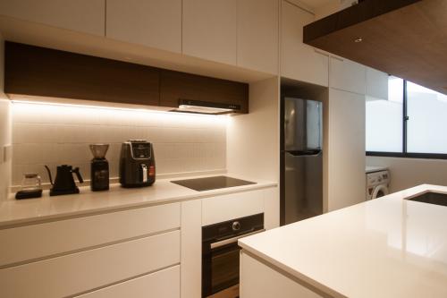 Contemporary Kitchen at Sims Place