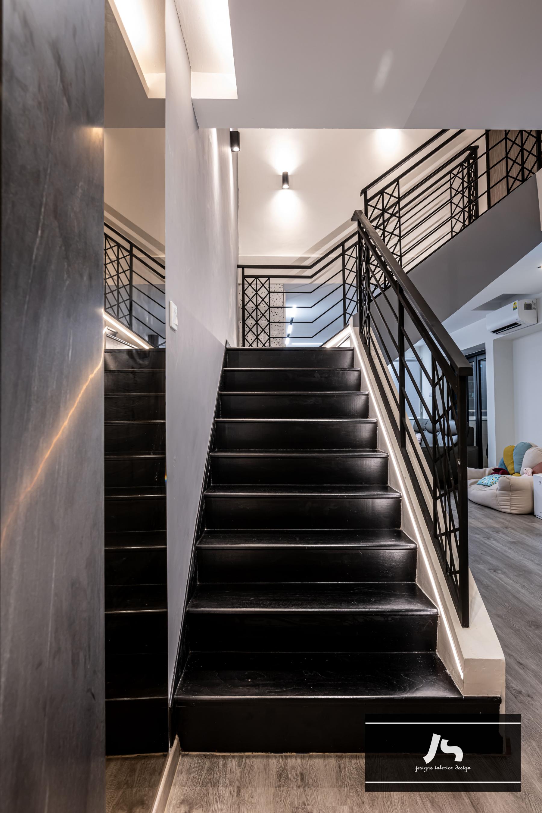 Modern Hallway with Drop Light and Staircase
