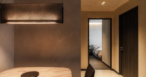 Minimalist Dining Room at Gem Residence