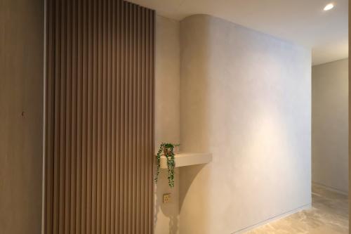 Minimalist Living Room at 4 Bedroom Condo @ Amber Garden