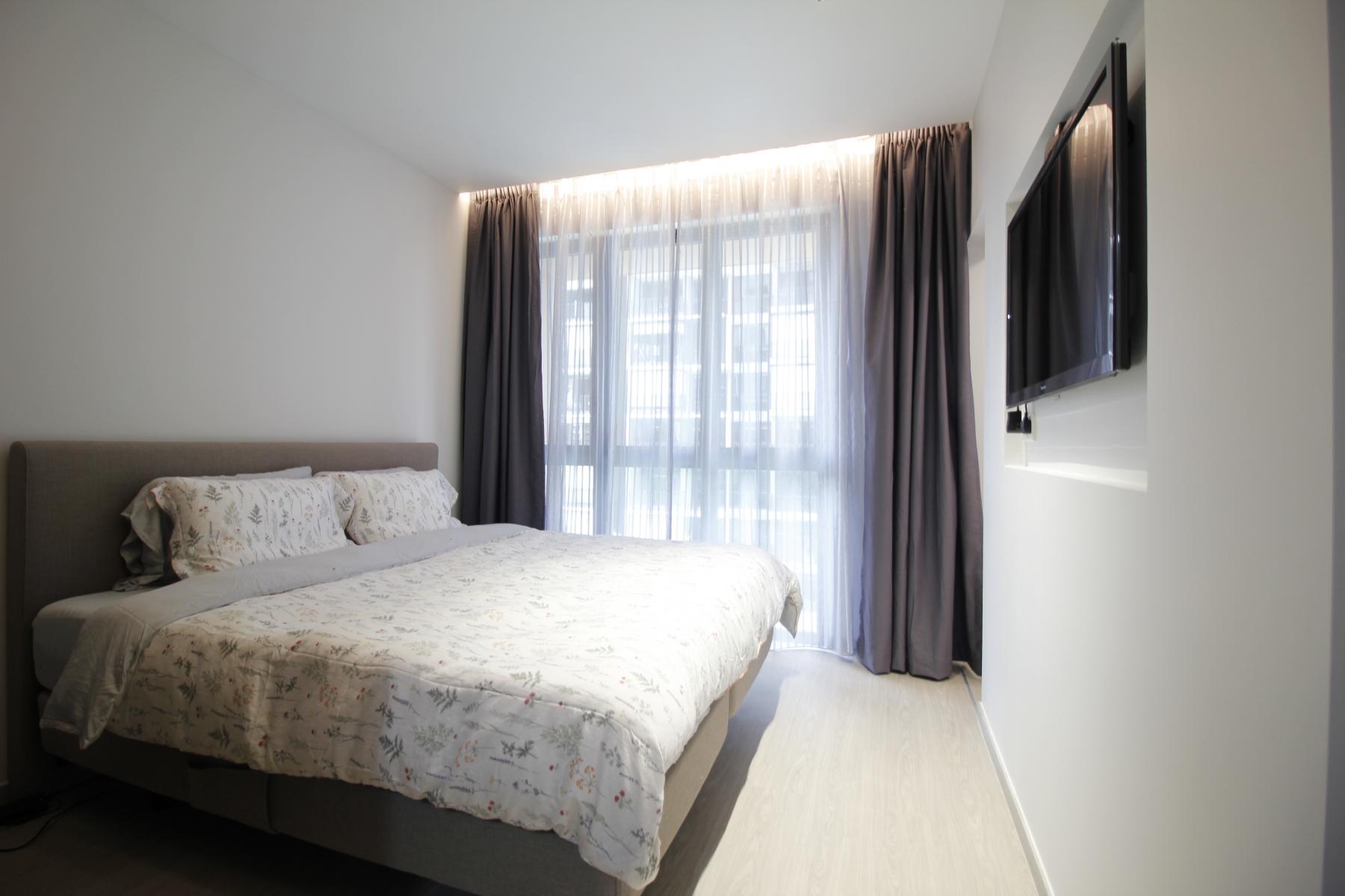 Modern Bedroom with Platform Bed and Vinyl Flooring
