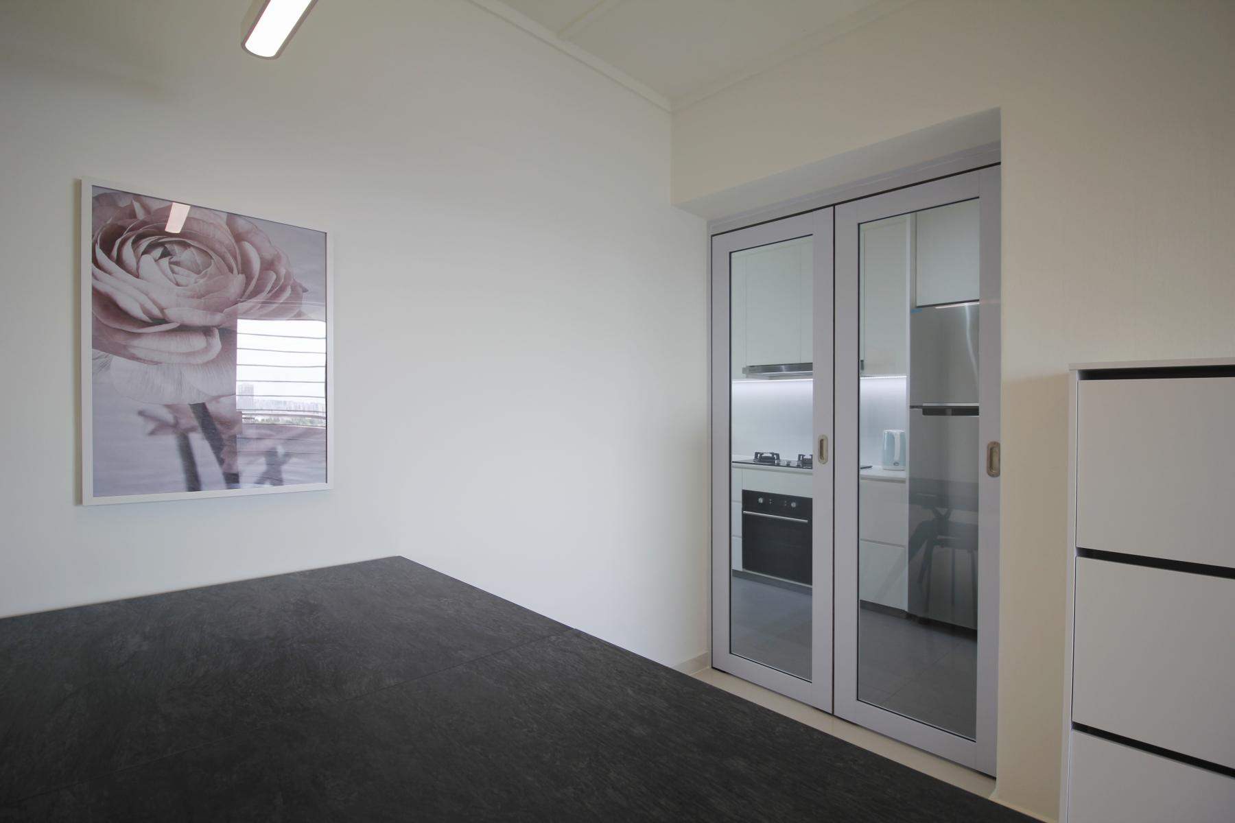 Contemporary Hallway with Bookshelf and Artwork
