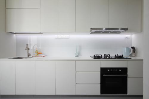 Contemporary Kitchen at White Minimalist