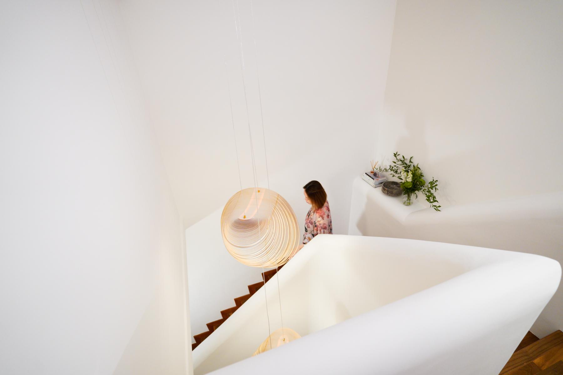 Scandinavian Hallway with Staircase and Houseplants