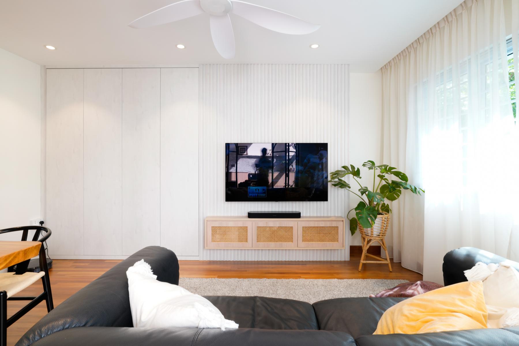 Scandinavian Living Room with TV Console and Feature Wall