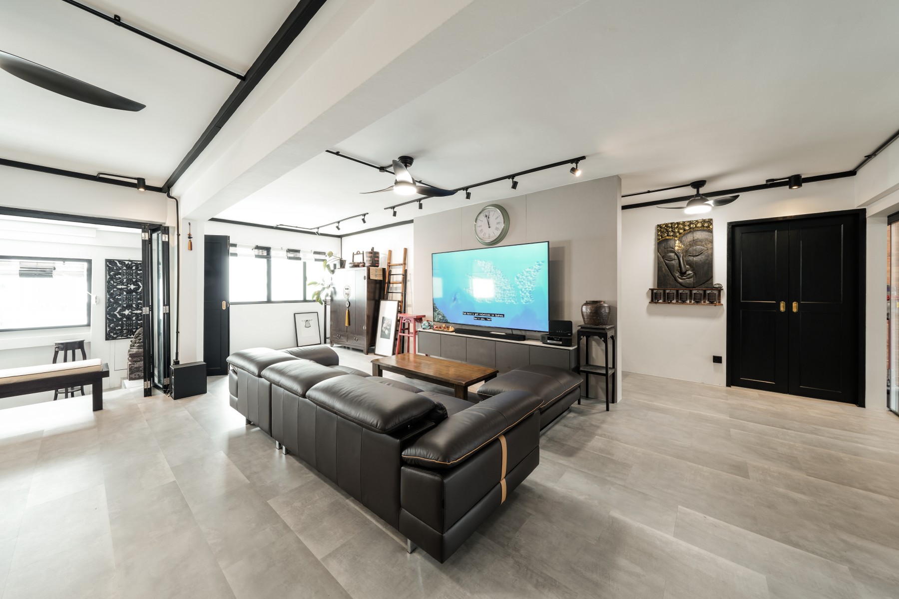 Industrial Living Room with Homogeneous Tiles and TV Console
