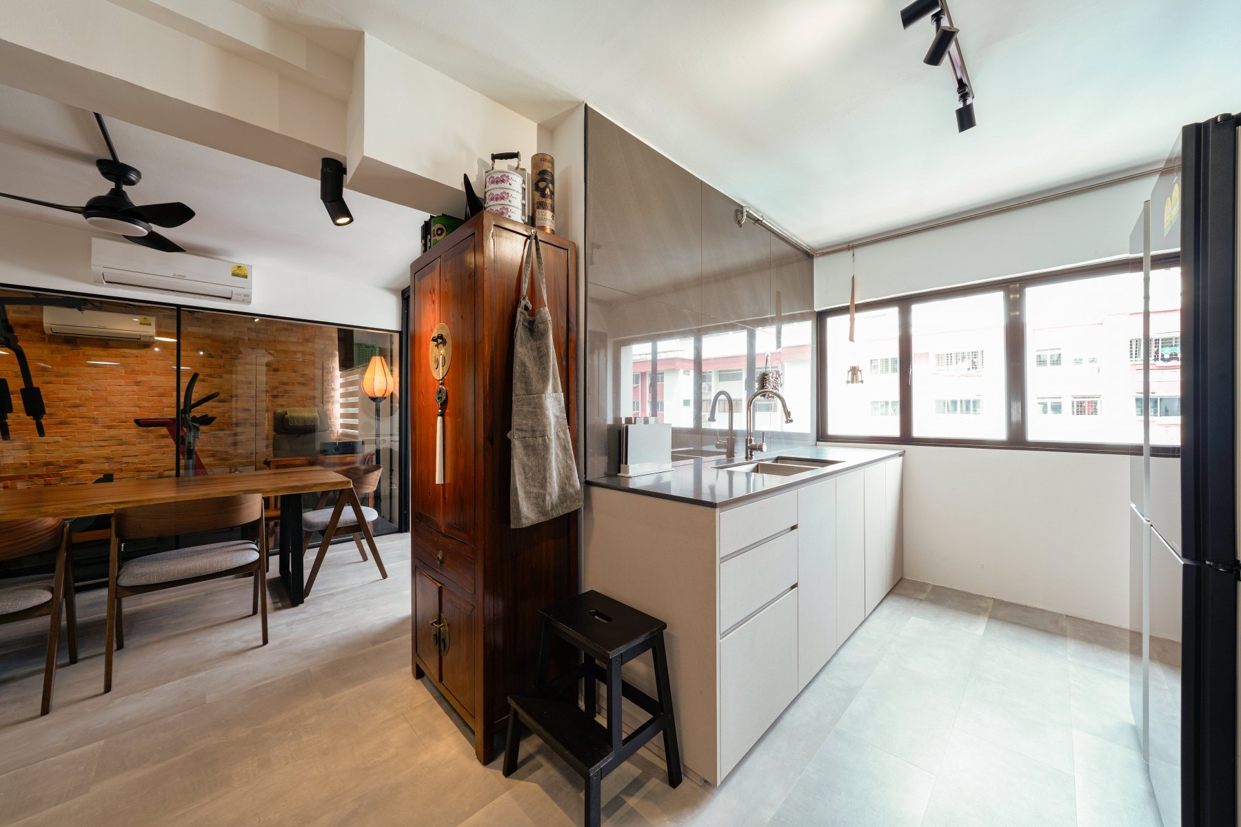 Industrial Kitchen with Homogeneous Tiles and Breakfast Counter
