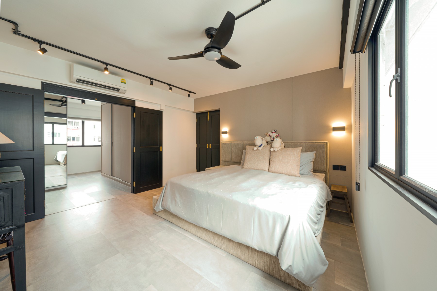 Industrial Bedroom with Homogeneous Tiles and Wardrobe