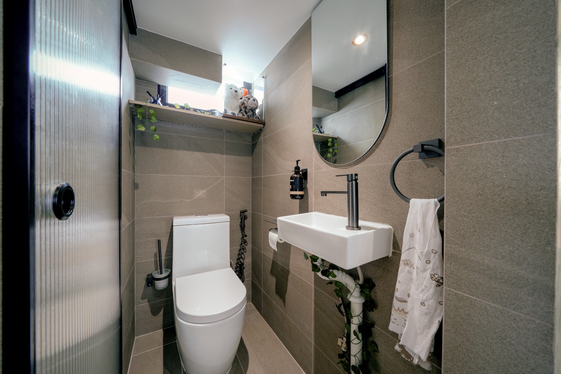 Scandinavian Bathroom with Homogeneous Tiles and Mirror