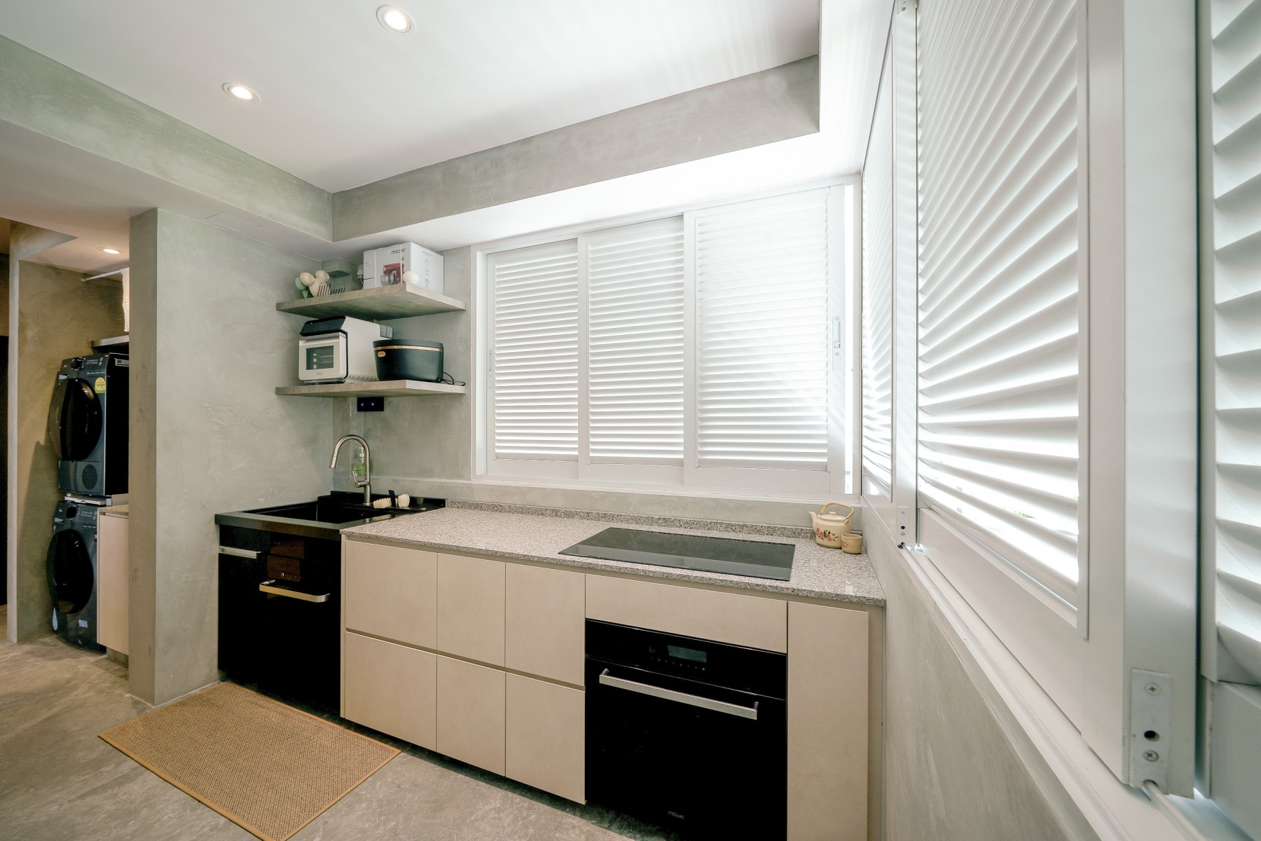 Scandinavian Kitchen with Cement Floor and Cupboard