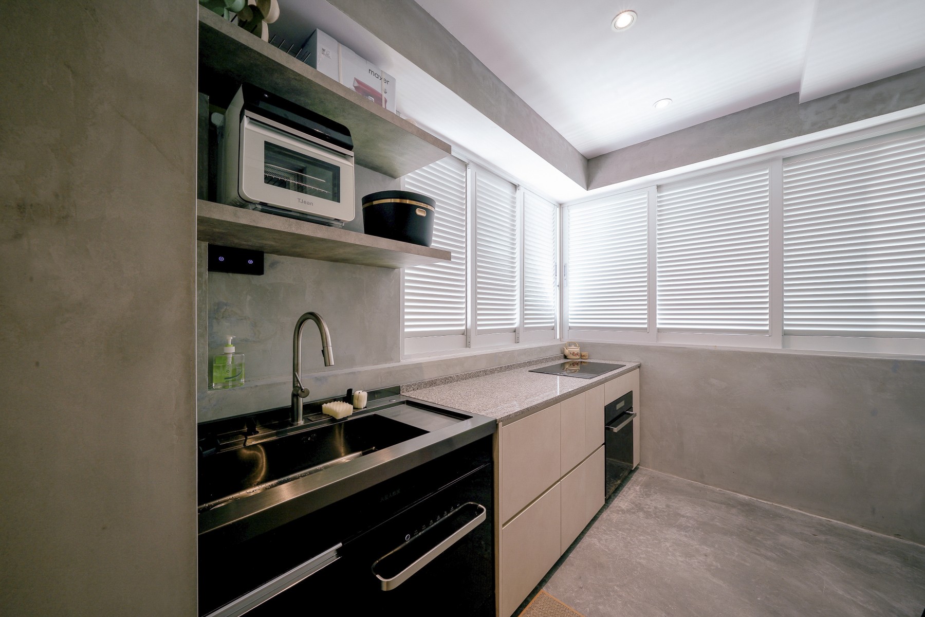 Scandinavian Kitchen with Cement Floor and Window Shutters