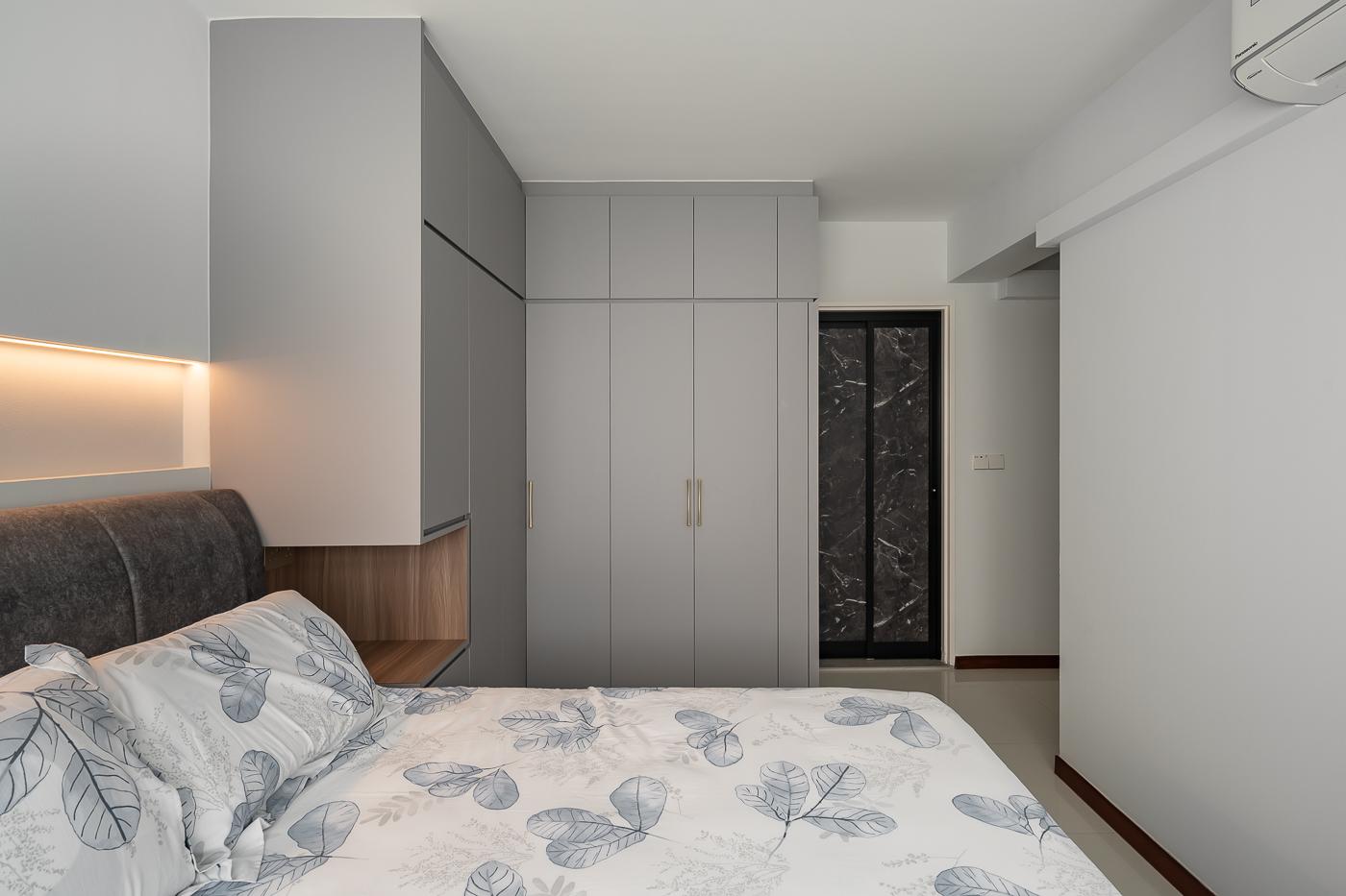 Modern Bedroom with Homogeneous Tiles and Cove Lighting