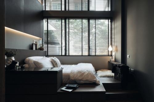 Industrial Bedroom at Alcove home at mon jervois