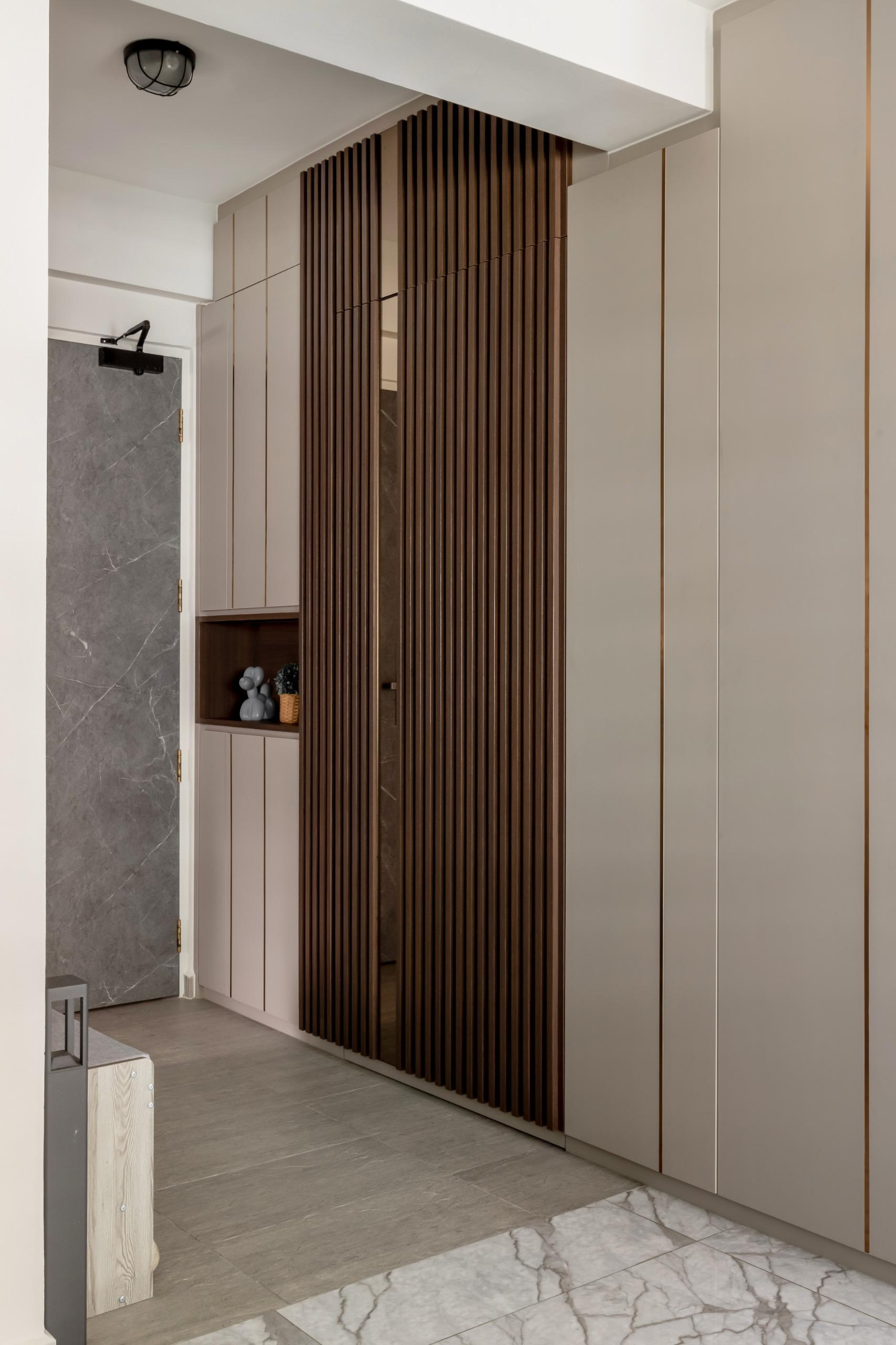 Contemporary Entryway with Shoe Cabinets and Doors